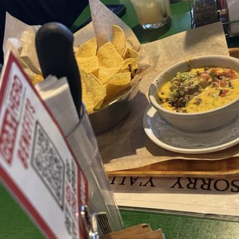 Rodeo Goat - TOSTADA CHIPS & QUESO - Burgers Near Me - Dallas, Texas