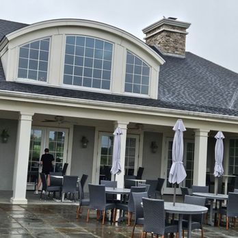 North Fork Taste and Tours - Sparkling Pointe deck on a rainy afternoon. - Wine Tours Near Me - East Marion, New York North Fork Taste and Tours - Sparkling Pointe deck on a rainy afternoon. - Wine Tours Near Me - East Marion, New York