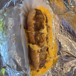 Regular hot dog with chili & cheese... Whatta mess!