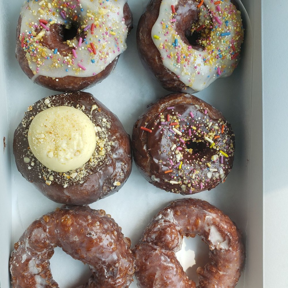 Curiosity Doughnuts - Half dozen doughnuts. 2 vanilla crueller, 2 vanilla birthday cake, 1 Boston creme, 1 chocolate birthday cake... so goooood - Donuts Near Me - Furlong, Pennsylvania Curiosity Doughnuts - Half dozen doughnuts. 2 vanilla crueller, 2 vanilla birthday cake, 1 Boston creme, 1 chocolate birthday cake... so goooood - Donuts Near Me - Furlong, Pennsylvania
