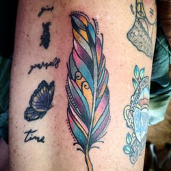 Bella Rose Tattoo Parlor - Colorful feather
