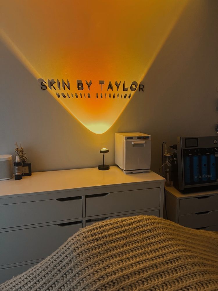 Skin by Taylor Logo