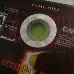 Sadly when I got home I realized Resident Evil 5 has some small cracks in the innermost part of the disc.