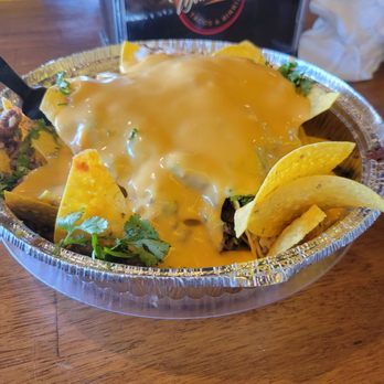 Tacos El Tijuanense - Nachos with Carne Asada - Beer, Wine & Spirits Near Me - North Hills, California Tacos El Tijuanense - Nachos with Carne Asada - Beer, Wine & Spirits Near Me - North Hills, California