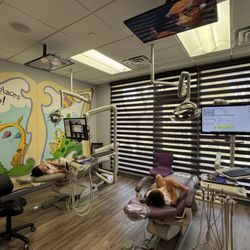 My Dentist & Me - They are completely comfortable at their dentist's, shoes off and everything !