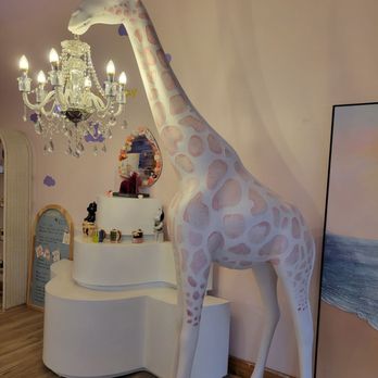Zoe's Bakery - Giraffe sculpture with chandelier - Coffee & Tea Near Me - New Buffalo, Michigan Zoe's Bakery - Giraffe sculpture with chandelier - Coffee & Tea Near Me - New Buffalo, Michigan