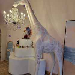 Zoe's Bakery - Giraffe sculpture with chandelier