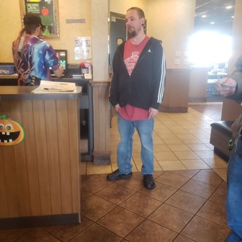 Pizza Hut - a man standing in front of a counter - Pizza Near Me - Marion, Indiana Pizza Hut - a man standing in front of a counter - Pizza Near Me - Marion, Indiana