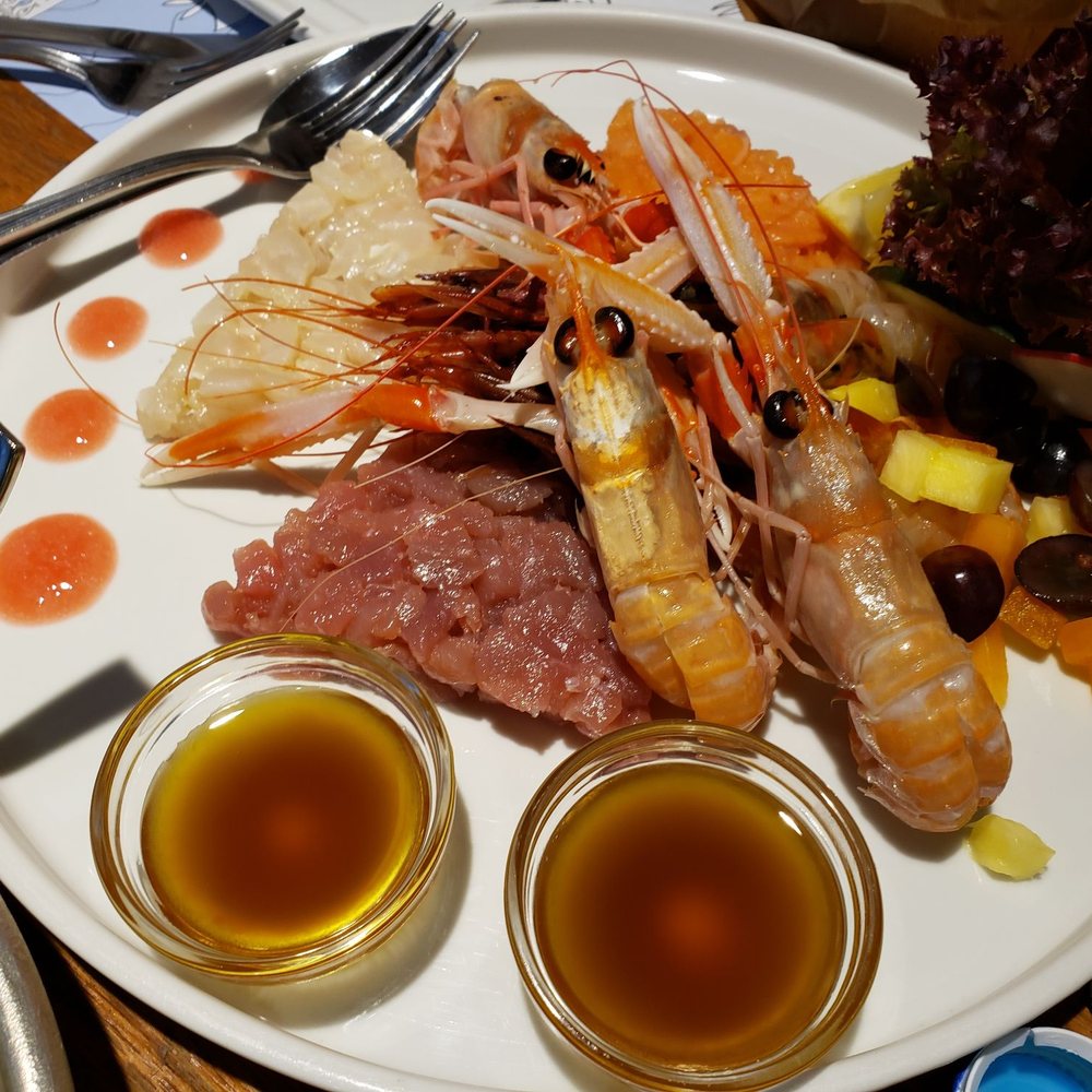 Crudo of Shrimp, Prawns, white fish, tuna, and Salmon Crudo of Shrimp, Prawns, white fish, tuna, and Salmon