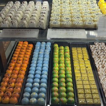 William Dean Chocolatier - The passion fruit ones on the lower left are my favorite - Chocolatiers & Shops Near Me - Tampa, Florida William Dean Chocolatier - The passion fruit ones on the lower left are my favorite - Chocolatiers & Shops Near Me - Tampa, Florida