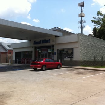 Chevron - a red car parked in front of a gas station - Convenience Stores Near Me - Atlanta, Georgia Chevron - a red car parked in front of a gas station - Convenience Stores Near Me - Atlanta, Georgia