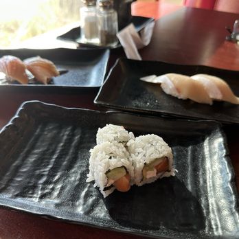 Sushi Tachi - Half a Philadelphia roll, with yellowtail and albacore nigiri - Sushi Bars Near Me - North Las Vegas, Nevada Sushi Tachi - Half a Philadelphia roll, with yellowtail and albacore nigiri - Sushi Bars Near Me - North Las Vegas, Nevada
