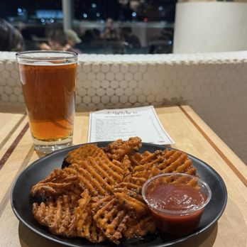 Root Down DIA - Hot honey sweet potato waffle fries - New American Near Me - Denver, Colorado Root Down DIA - Hot honey sweet potato waffle fries - New American Near Me - Denver, Colorado