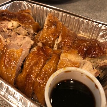 KK Asian Market - whole hacked chicken with soy sauce and hot sauce on the side (we ate a few pieces before remembering to snap this) - International Grocery Near Me - Danbury, Connecticut