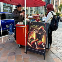 Strawberry In Chocolate DTLA - Outdoor/small business. Menu: 10$ regular chocolate covered strawberries & 15$ for strawberries with Dubai chocolate.