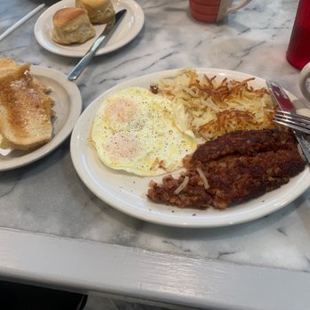 Angela's Cafe - Over medium eggs , hash browns, corn beef hash and toast - Breakfast & Brunch Near Me - Dallas, Texas