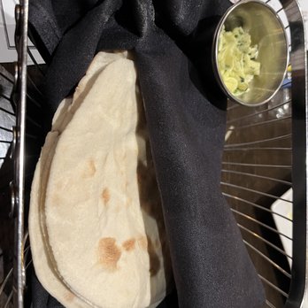 Downtowner Woodfire Grill - Bread - more like chewy tortillas.  Butter was good, though. - Pizza Near Me - Saint Paul, Minnesota
