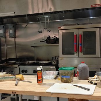 Hometown Fare - a chef in a commercial kitchen - New American Near Me - Hoover, Alabama Hometown Fare - a chef in a commercial kitchen - New American Near Me - Hoover, Alabama