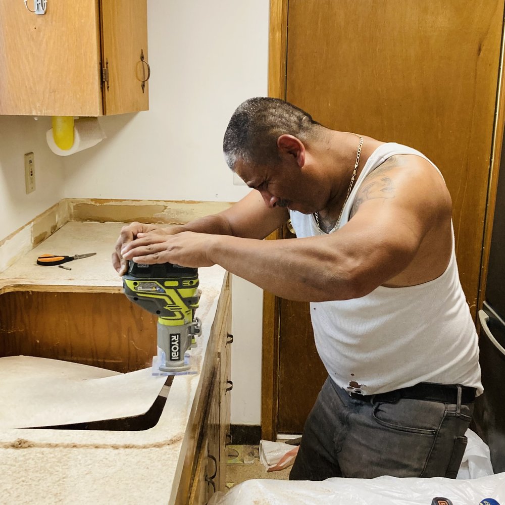 DP Lawn Service - a man working in a kitchen - Lawn Services Near Me - Portland, Oregon DP Lawn Service - a man working in a kitchen - Lawn Services Near Me - Portland, Oregon