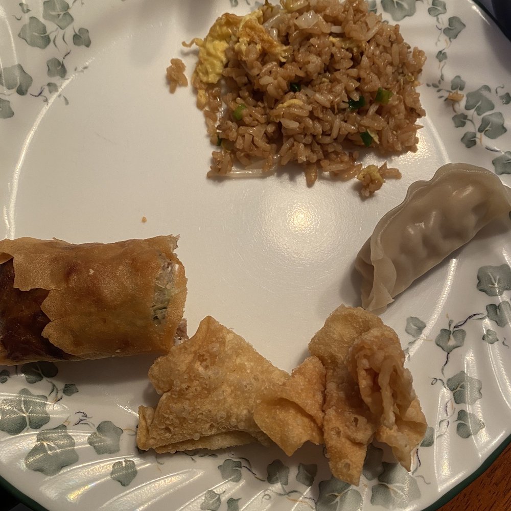 Clockwise: Mushroom fried rice, dumpling, cream cheese wonton, egg roll.