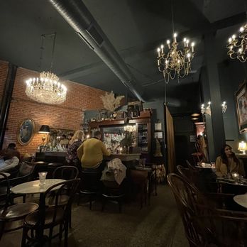 Cheval - a dining room with chandeliers and tables - Cocktail Bars Near Me - Kansas City, Missouri Cheval - a dining room with chandeliers and tables - Cocktail Bars Near Me - Kansas City, Missouri
