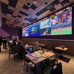 Dave & Buster's Reno - Dining area large screens 10/2/25