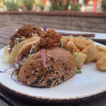 peasants FEAST - Hot chicken sandwich, they cut it half for us knowing we are sharing - American Near Me - Solvang, California peasants FEAST - Hot chicken sandwich, they cut it half for us knowing we are sharing - American Near Me - Solvang, California