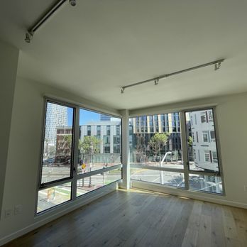 Smart & Beyond Painting - Painted living room with tall ceilings and windows - Painters Near Me - San Francisco, California Smart & Beyond Painting - Painted living room with tall ceilings and windows - Painters Near Me - San Francisco, California