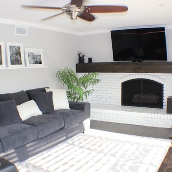 Ritchie Bros Construction - a living room with a fireplace - General Contractors Near Me Ritchie Bros Construction - a living room with a fireplace - General Contractors Near Me