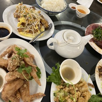 Phnom Penh - Fried rice cake (top), chicken wings (middle), squid (bottom) - Cambodian Near Me - Vancouver, British Columbia Phnom Penh - Fried rice cake (top), chicken wings (middle), squid (bottom) - Cambodian Near Me - Vancouver, British Columbia