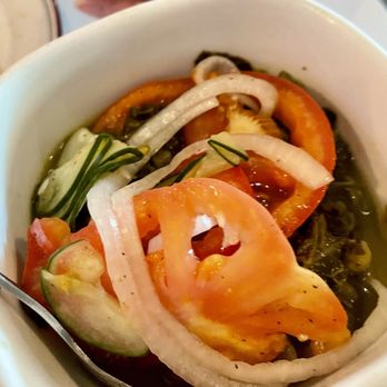 Eat. - Greens with tomatoes, cucumber and onions on top. - New American Near Me - Las Vegas, Nevada