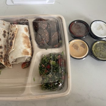 Dish N Dash - Sunnyvale - Togo packaging: Beef Shawarma Wrap, Tabouli & Falafel (4) with 4 sauces. - Middle Eastern Near Me - Sunnyvale, California Dish N Dash - Sunnyvale - Togo packaging: Beef Shawarma Wrap, Tabouli & Falafel (4) with 4 sauces. - Middle Eastern Near Me - Sunnyvale, California