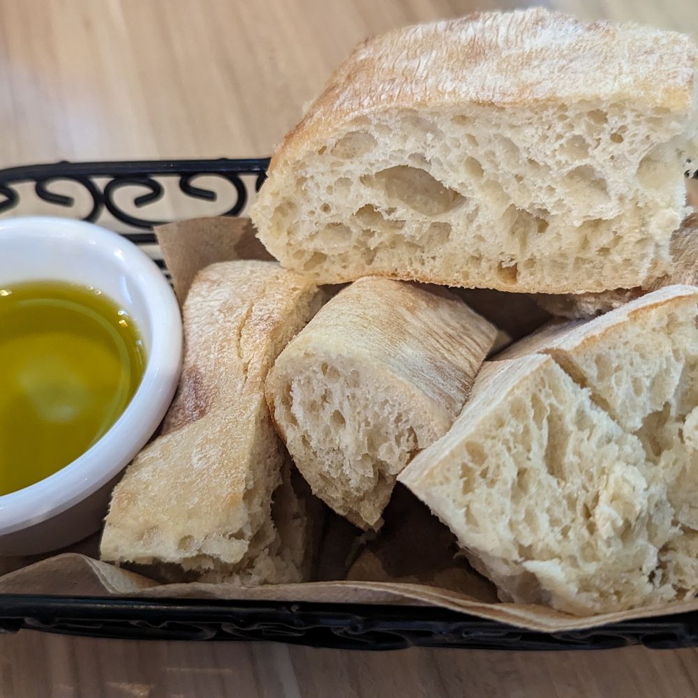 Cafe Azafran - Bread basket with olive oil for dipping - Breakfast & Brunch Near Me - Rehoboth Beach, Delaware Cafe Azafran - Bread basket with olive oil for dipping - Breakfast & Brunch Near Me - Rehoboth Beach, Delaware