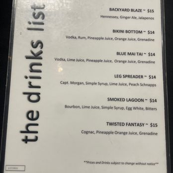 Backyard Barbeque - Drinks Menu - A drinks menu featuring cocktails like Woodclet, Backyard Blaze, Bikini Bottom, Blue Mai Tai, Leg Spreader, Smoked Lagoon, and Twisted Fantasy with their ingredients and prices. - Barbeque Near Me - Freeport, New York