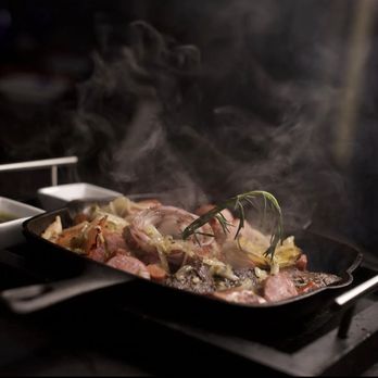 Atomic Lounge and Bar - a pan of food being cooked - Latin American Near Me - Miami, Florida