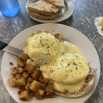 Henrys Diner - Crabby Eggs Benedict with home fries and Greek bread toast - Diners Near Me - Burlington, Vermont