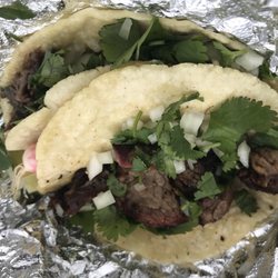 Tierra y Fuego Taqueria - Suadero (smoked brisket) in front and the Barboca (slow cooked beef) in the back