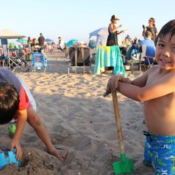 Arborland Education & Youth Activity Center - Primary students working hard on some sand construction.