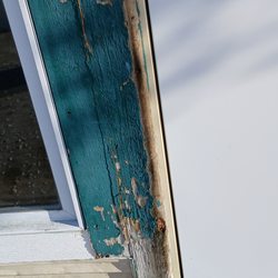 Silver Creek Apartments - Peeling paint on door frame