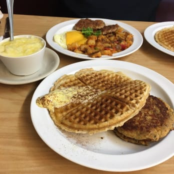 The Serving Spoon - Waffle with salmon croquettes and a side of grits - Breakfast & Brunch Near Me - Inglewood, California The Serving Spoon - Waffle with salmon croquettes and a side of grits - Breakfast & Brunch Near Me - Inglewood, California
