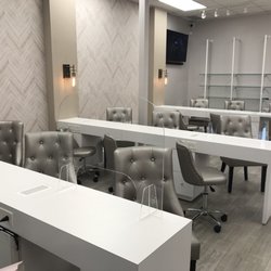 Elegant manicure tables with exhaust system built in.
