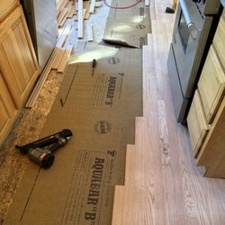 Altitude Hardwood Floors - Before: Hardwood floor water damage repair