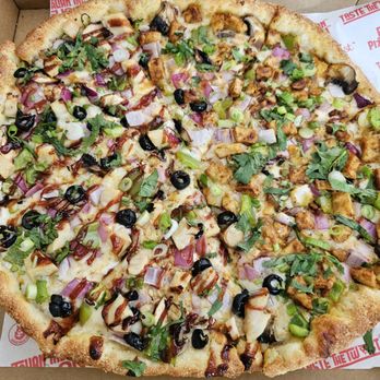 Pizza Twist - Deep dish pizza with half Chicken Tikka Masala and half Bombay Garlic Chicken - Pizza Near Me - Cypress, Texas Pizza Twist - Deep dish pizza with half Chicken Tikka Masala and half Bombay Garlic Chicken - Pizza Near Me - Cypress, Texas