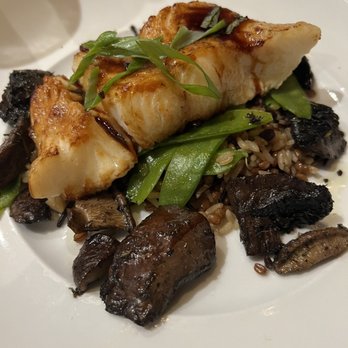 Seasons 52 - Sea Bass with mushrooms - New American Near Me - Coral Gables, Florida Seasons 52 - Sea Bass with mushrooms - New American Near Me - Coral Gables, Florida