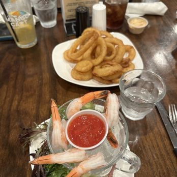 PSJ Cellar Restaurant And Bar - Appetizers- onion rings and shrimp cocktail - New American Near Me - Port Saint John, Florida