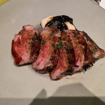 Ristorante TOSCA - a piece of steak on a plate - Italian Near Me - Washington, DC, District of Columbia