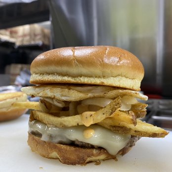 Uburger - The Big Dubrowski. Sharp cheddar, grilled onions, fries, spicy spread and a fried egg. - Burgers Near Me - Andover, Massachusetts Uburger - The Big Dubrowski. Sharp cheddar, grilled onions, fries, spicy spread and a fried egg. - Burgers Near Me - Andover, Massachusetts