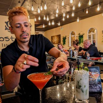 Tostao's Tapas-bar - Marco putting the final touches on our drinks - Tapas Bars Near Me - Nashua, New Hampshire