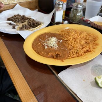 Taqueria Los Compadres - 2 carne asada tacos (plain) with a side of beans and rice. - Mexican Near Me - Sacramento, California