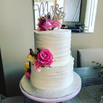 Cake Boutique - Beautiful wedding cake - vanilla cake with strawberry buttercream inside and vanilla buttercream outside. - Custom Cakes Near Me